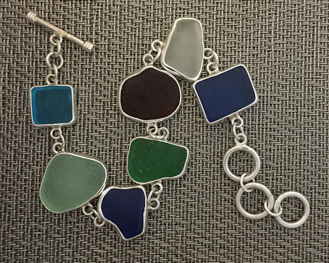 small seaglass set in sterling silver bracelet