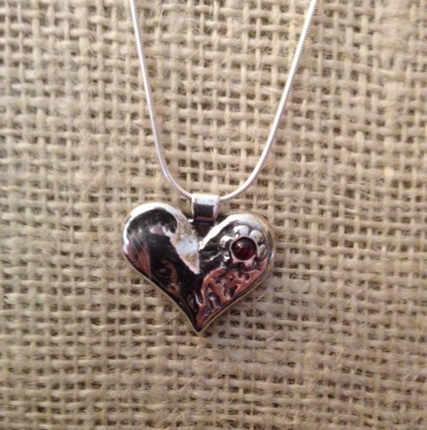 Sterling heart and garnet necklace by Tamir Zuman