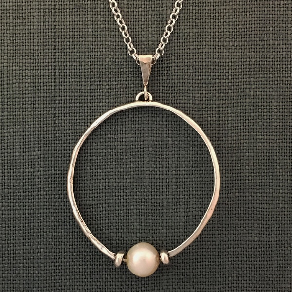 Flat sterling circle with pearl necklace by Zuman Jewelry