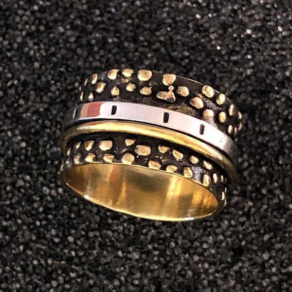 brass dot spinner ring by Ritual Jewelry