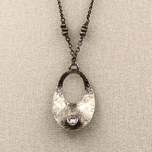 CZ in concave shell pendant
